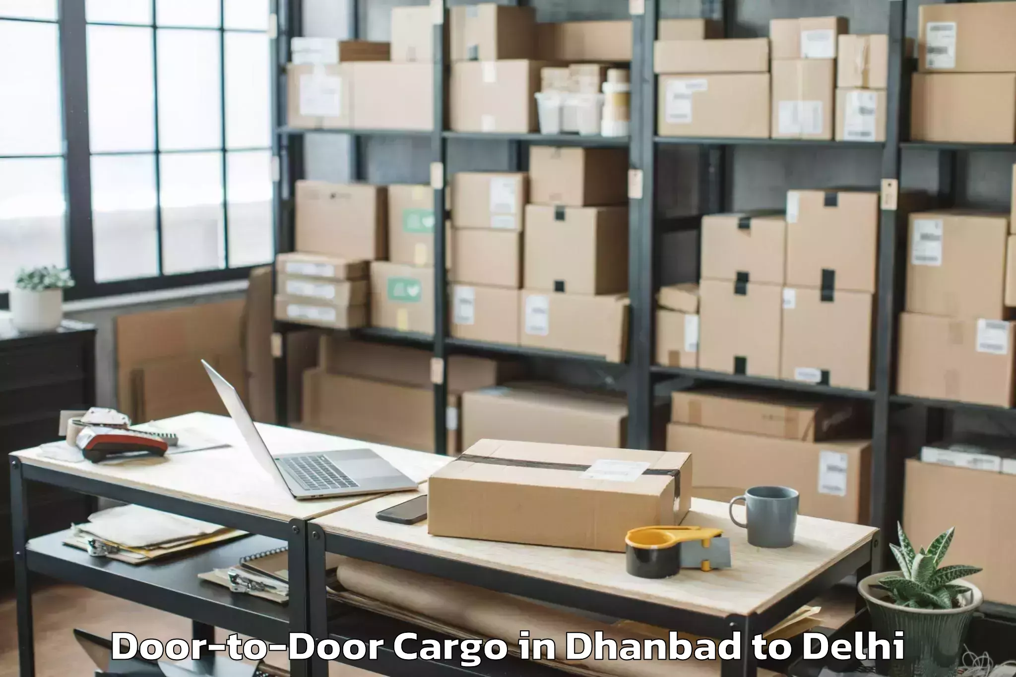 Hassle-Free Dhanbad to Naraina Industrial Estate Door To Door Cargo